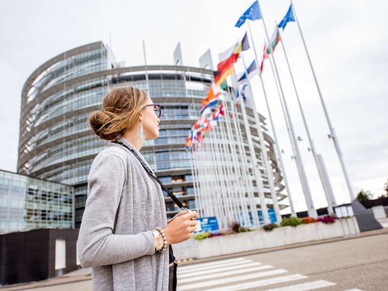 woman-near-the-european-parliament-building-in-str-2025-03-13-07-10-49-utc(1)